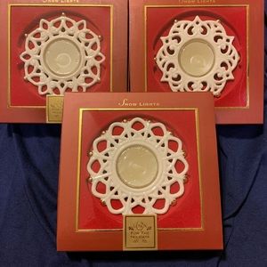 Lenox porcelain snowflake votive holders. Set of 3